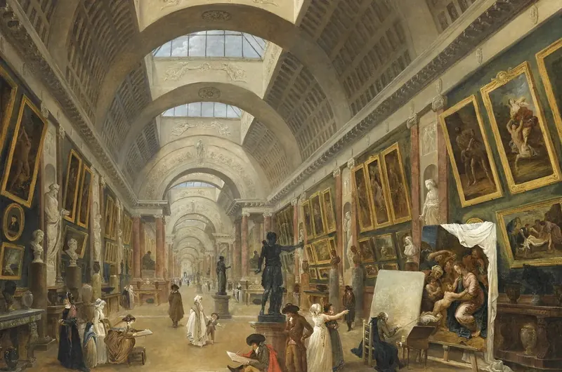 A long vaulted gallery lit from skylights, its walls hung with paintings, visitors and artists at work along its length.